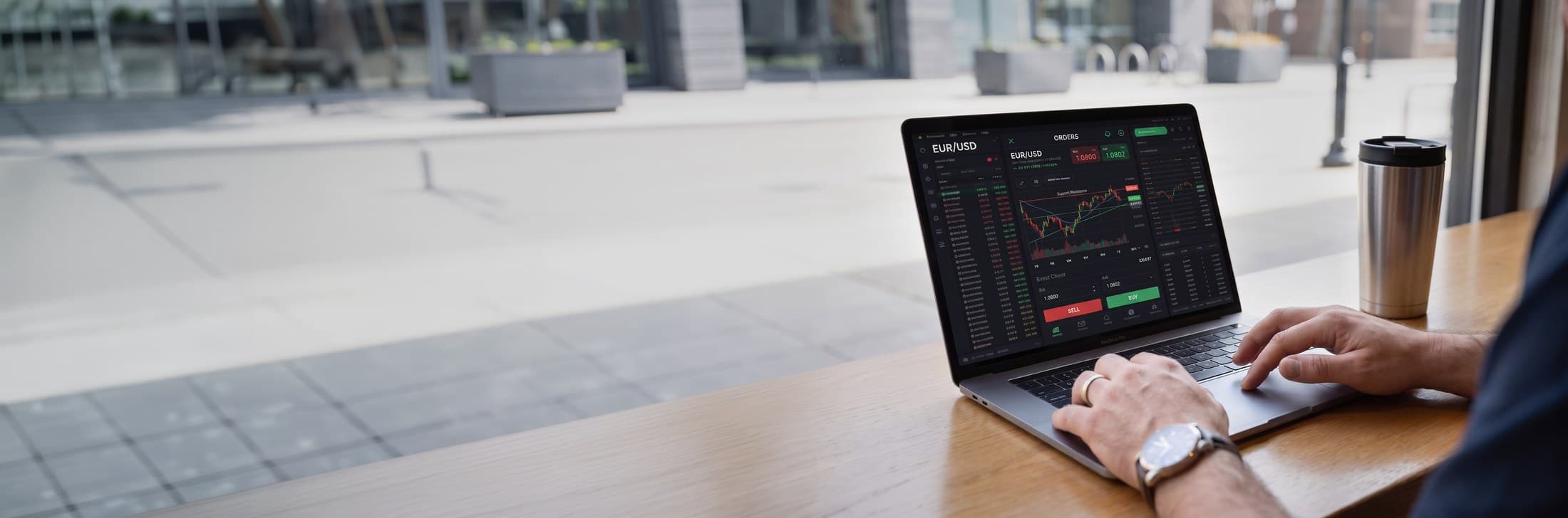 Trader placing a EUR/USD order on a laptop trading platform
